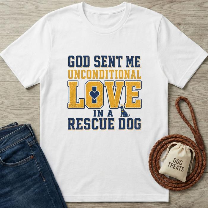 White cotton t-shirt with "God Sent Me Unconditional Love In A Rescue Dog" text and dog graphic.