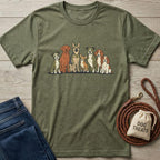 Olive green heather t-shirt featuring a graphic of seven diverse dog breeds in a line.