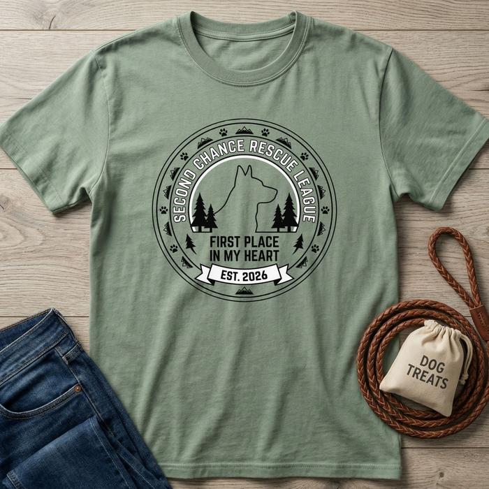 Sage green cotton t-shirt with "Second Chance Rescue League" dog and forest graphic.