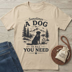 Beige Gildan Softstyle® 64000 t-shirt with "Sometimes a Dog Is All You Need" graphic featuring a black rescue dog.