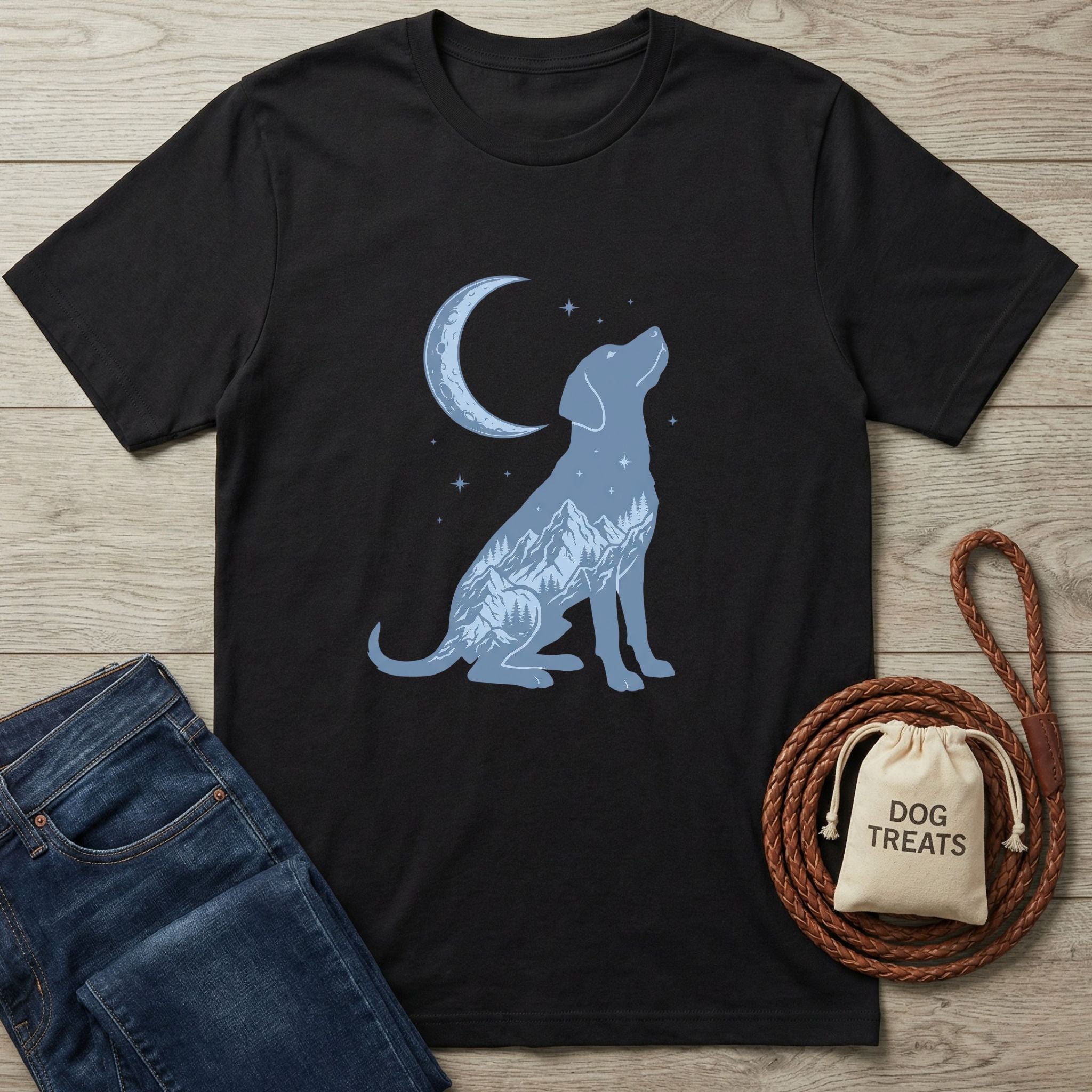 Black t-shirt with a blue moon and dog silhouette filled with mountain scenery.