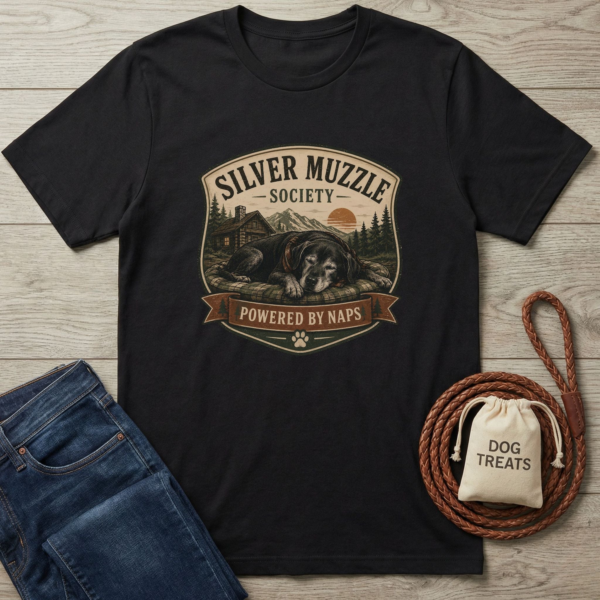 Black cotton t-shirt with "Silver Muzzle Society - Powered by Naps" graphic featuring a sleeping senior dog.