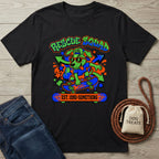 Black cotton t-shirt with a vibrant 90s-style graphic of a dog skateboarding, "Rescue Squad" text.