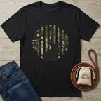 Black Nature Companion T-shirt with a dog silhouette against a striped camo and forest design.
