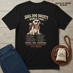 Black Soul Dog World Tour T-shirt with a graphic of a dog wearing sunglasses and a backpack, plus a list of dog adventures.