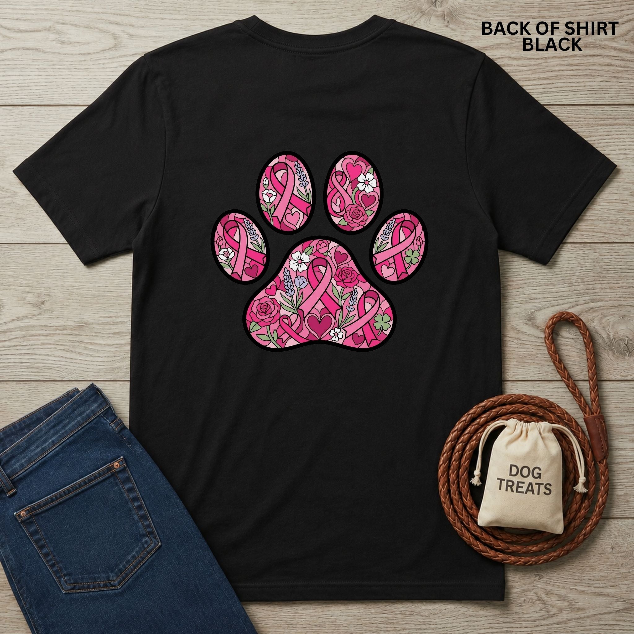 Black Gildan Softstyle® 64000 tee with a large pink paw print design featuring ribbons, hearts, and flowers.