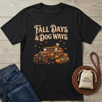 Black cotton t-shirt with "Fall Days & Dog Ways" text, vintage truck, golden retriever, and pumpkins design.