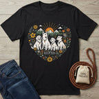 Black Gildan Softstyle® t-shirt with a heart-shaped floral design featuring four rescue dogs, mountains, and a sunset.