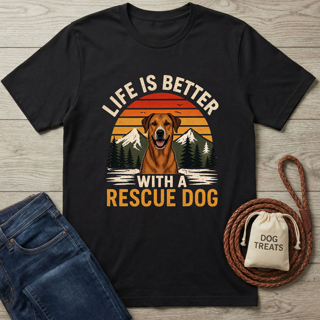 Black Gildan Softstyle t-shirt with "Life is Better With A Rescue Dog" graphic, featuring a dog and mountains.