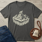 Charcoal gray cotton t-shirt with a cream graphic of a dog on a mountain peak surrounded by pine trees.