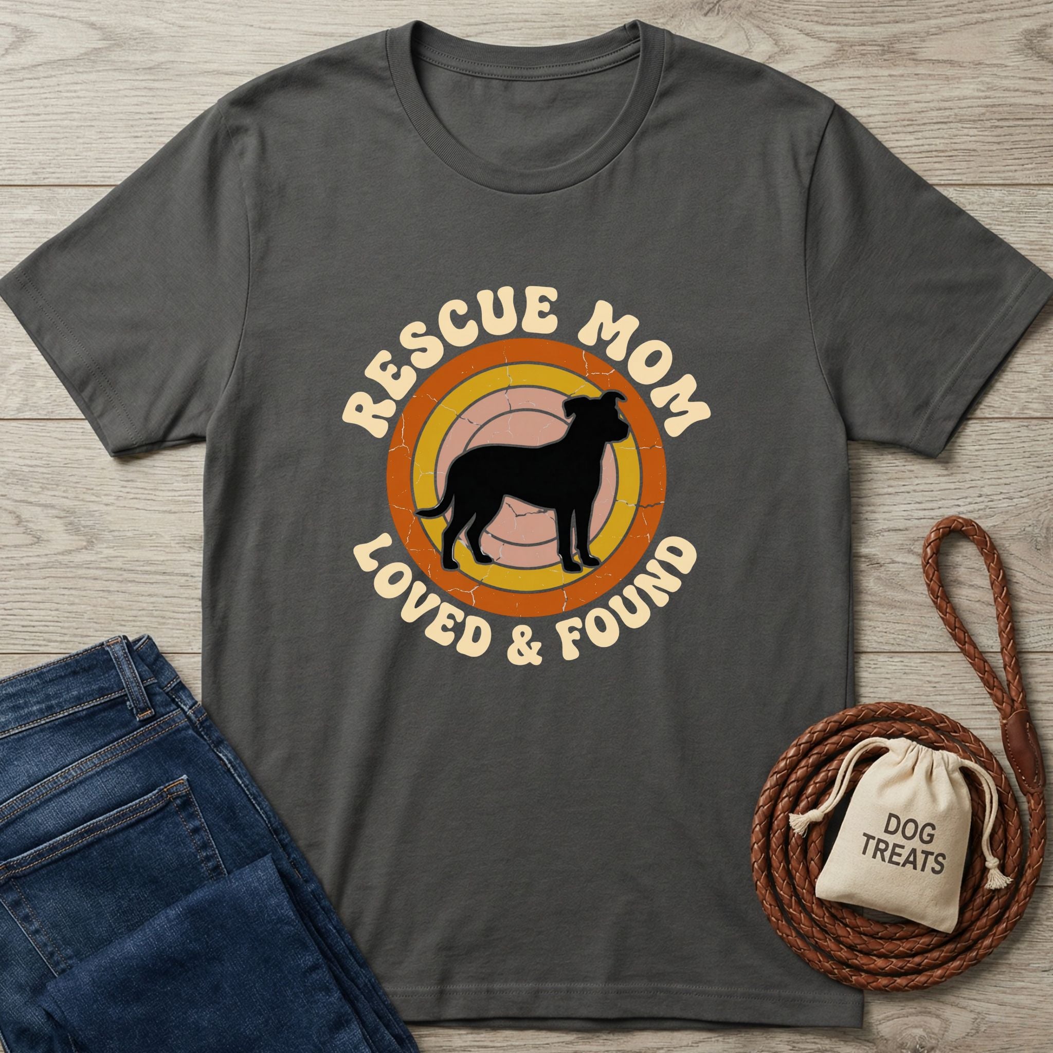 Charcoal gray Gildan Softstyle t-shirt with "Rescue Mom Loved & Found" text and a dog silhouette.