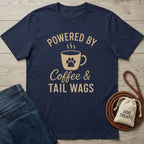 Navy blue t-shirt with "Powered by Coffee & Tail Wags" design featuring a paw print coffee mug.