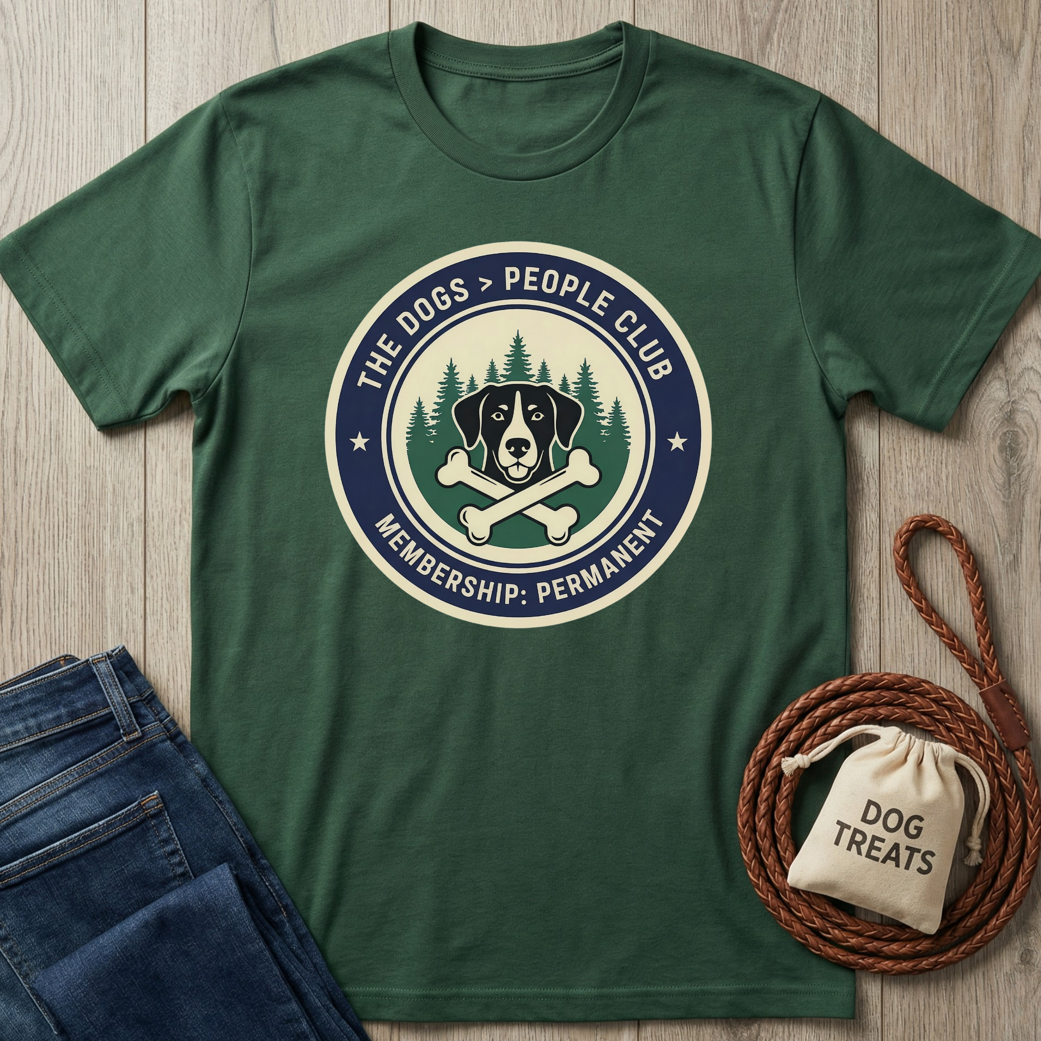 Dark green cotton t-shirt with "The Dogs > People Club" logo featuring a dog, bones, and trees.