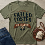 Olive green "Official Failed Foster Success Story No Regrets" t-shirt with distressed text, paw prints, and a ribbon design.
