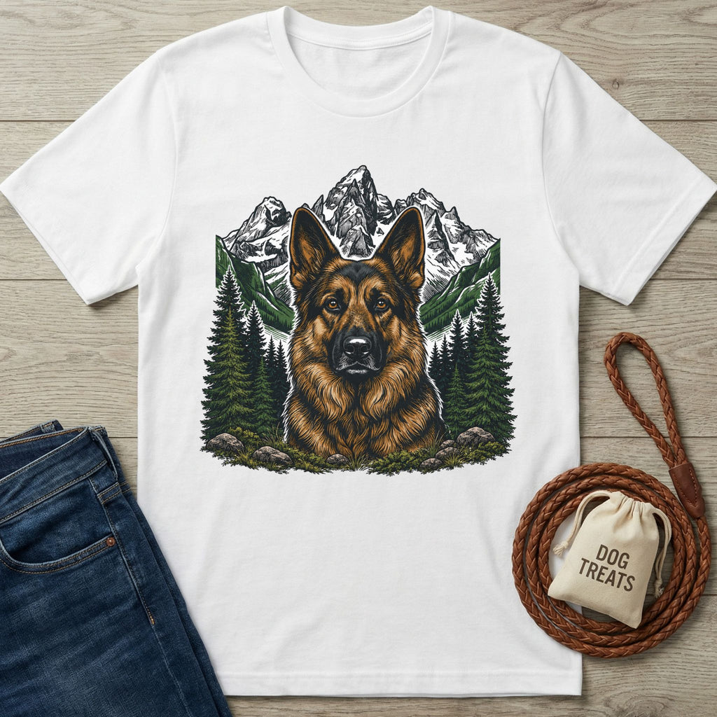 White cotton t-shirt featuring a detailed German Shepherd portrait against a mountain and pine forest landscape.