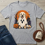 Grey t-shirt featuring a Golden Retriever in a ghost costume, a pumpkin, and a haunted house under a harvest moon.