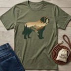 Olive green Mountain Dog T-shirt with a large Saint Bernard silhouette filled with a forest and mountain landscape.