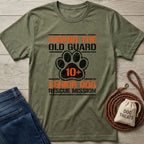 Olive green "Saving The Old Guard Senior Dog Rescue Mission" t-shirt with a paw print and "10+" design.