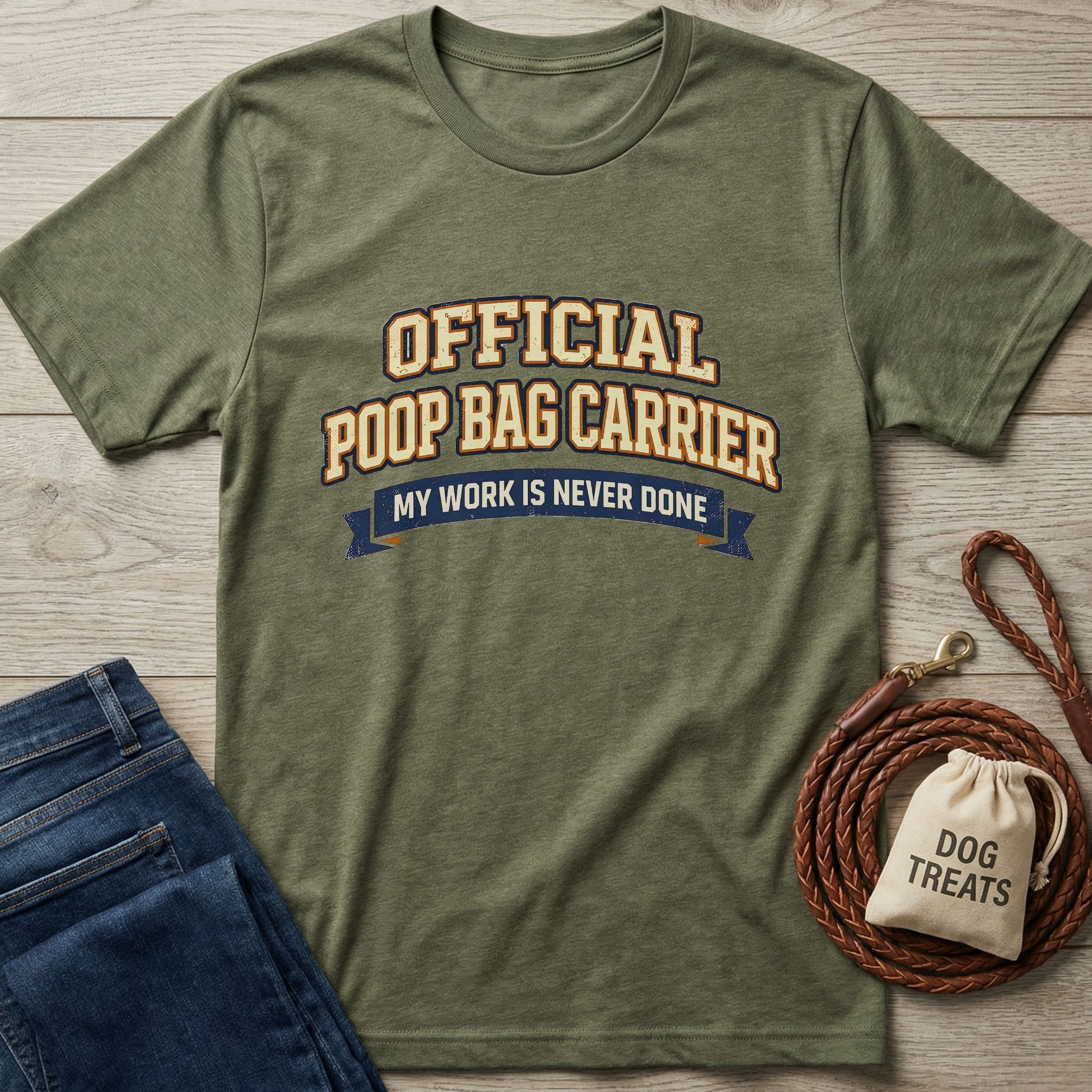 Olive green "Official Poop Bag Carrier" t-shirt with jeans, a leather leash, and a dog treat bag.