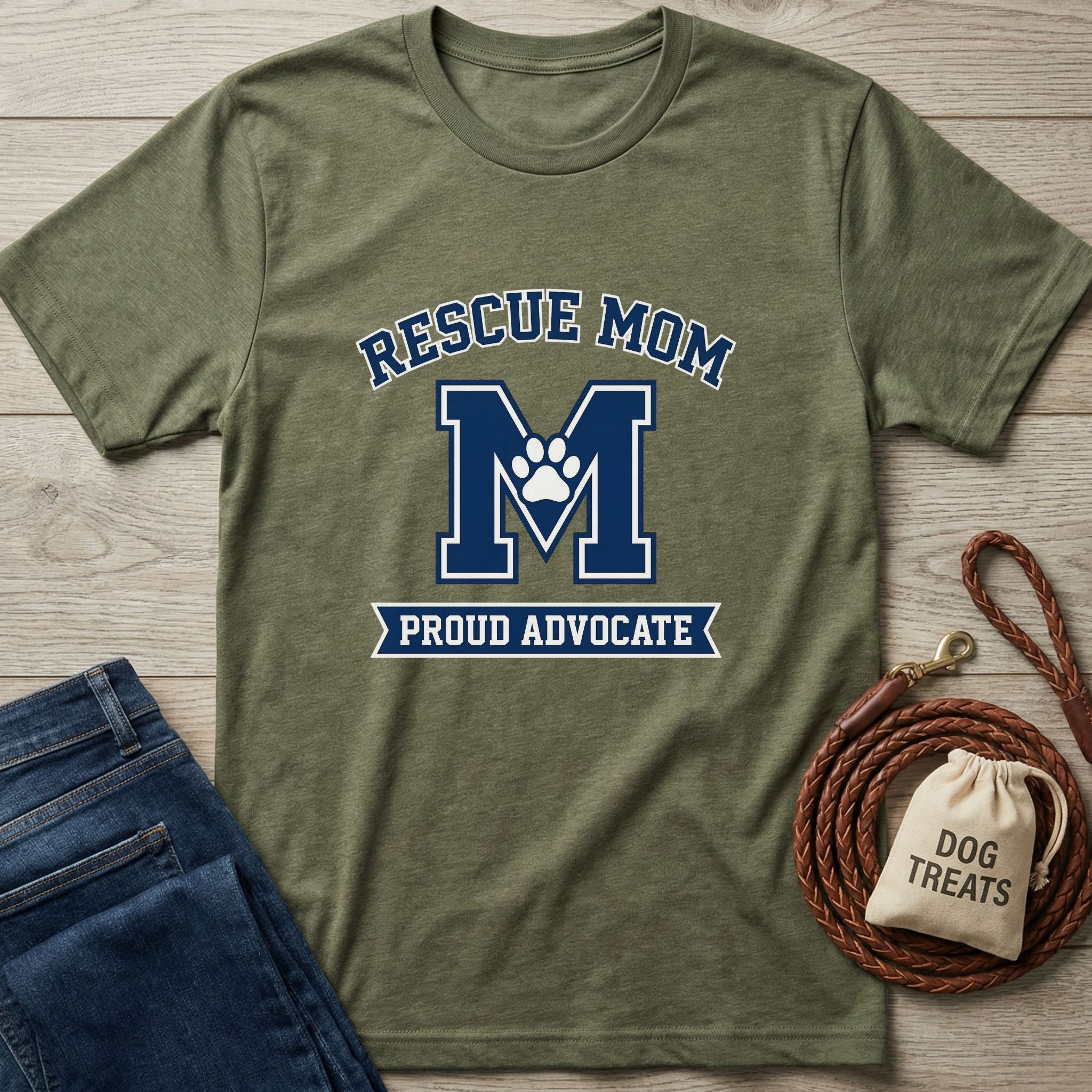 Olive green "Rescue Mom Proud Advocate" Gildan Softstyle t-shirt with blue text and paw print.