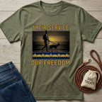 Olive green Gildan Softstyle t-shirt with "Their Service Our Freedom" text and a soldier walking a dog design.