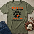Olive green "Saving The Old Guard Senior Dog Rescue Mission" t-shirt with paw print design.