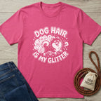 Pink Gildan Softstyle t-shirt with "Dog Hair Is My Glitter" graphic featuring a fluffy dog.