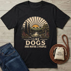 Black Gildan Softstyle® 64000 t-shirt with "I Like Dogs" graphic, jeans, and dog accessories.