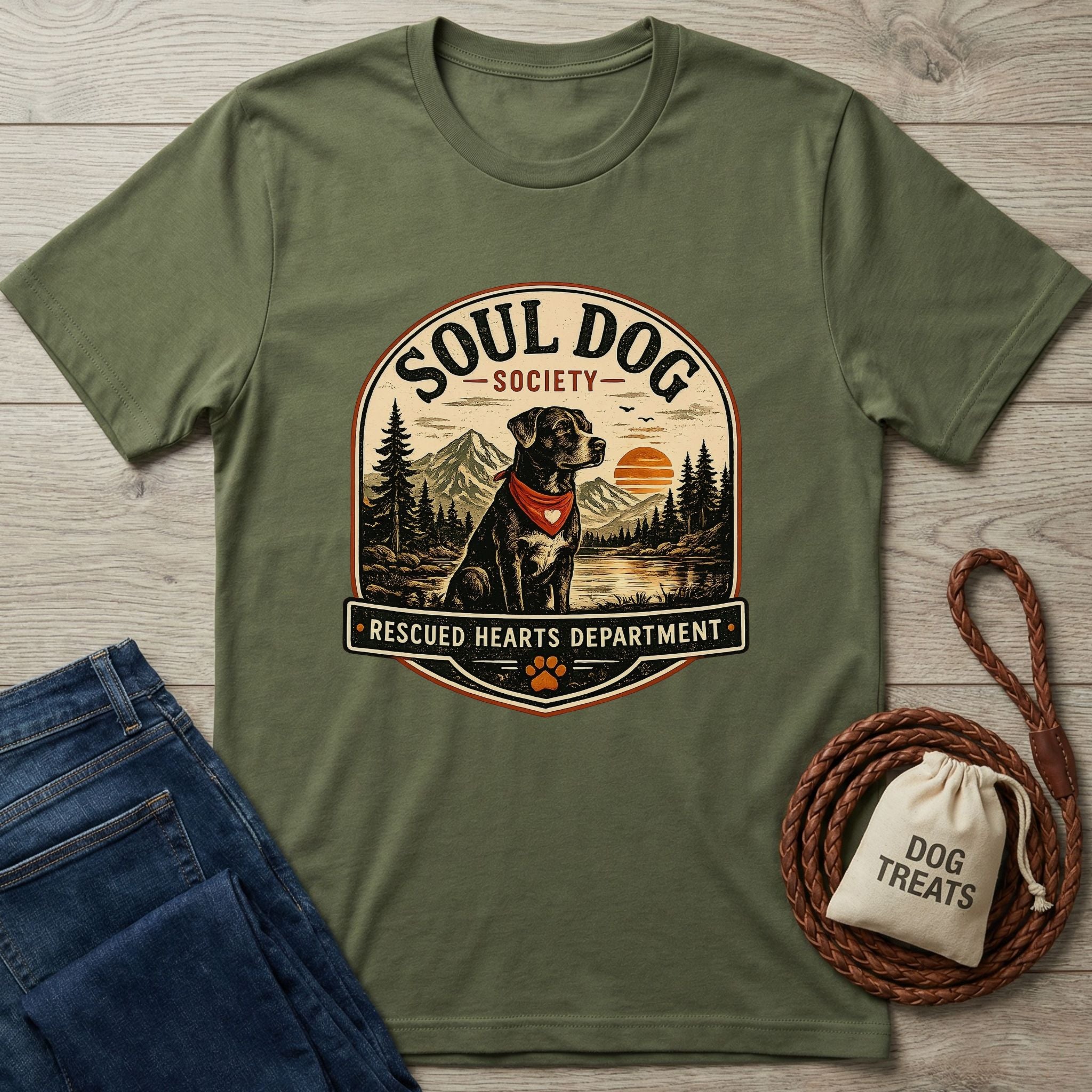Olive green "Soul Dog Society: Rescued Hearts Department" t-shirt featuring a black dog in a red bandana.