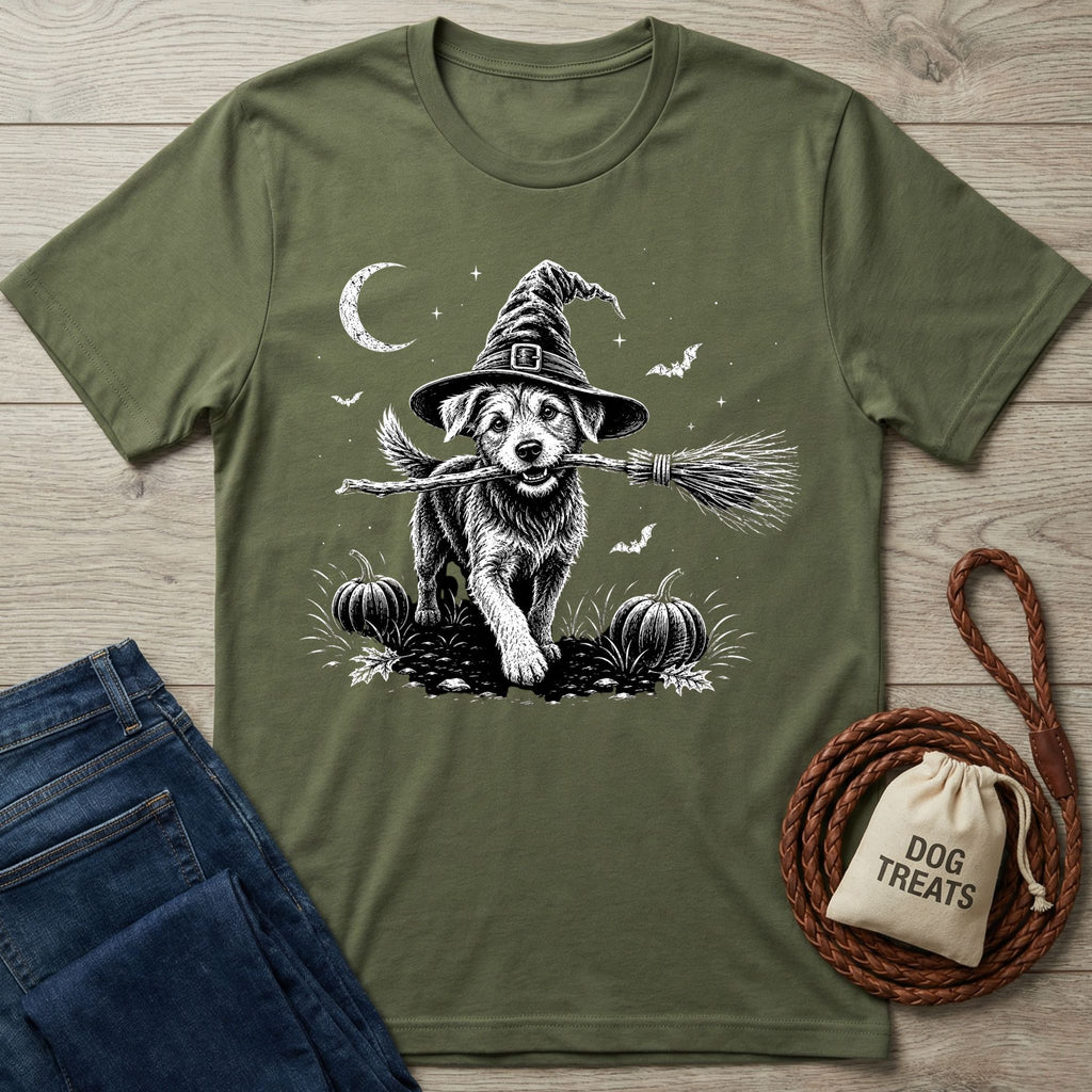 Olive green crewneck t-shirt featuring a white graphic of a dog in a witch hat holding a broomstick in a pumpkin patch.