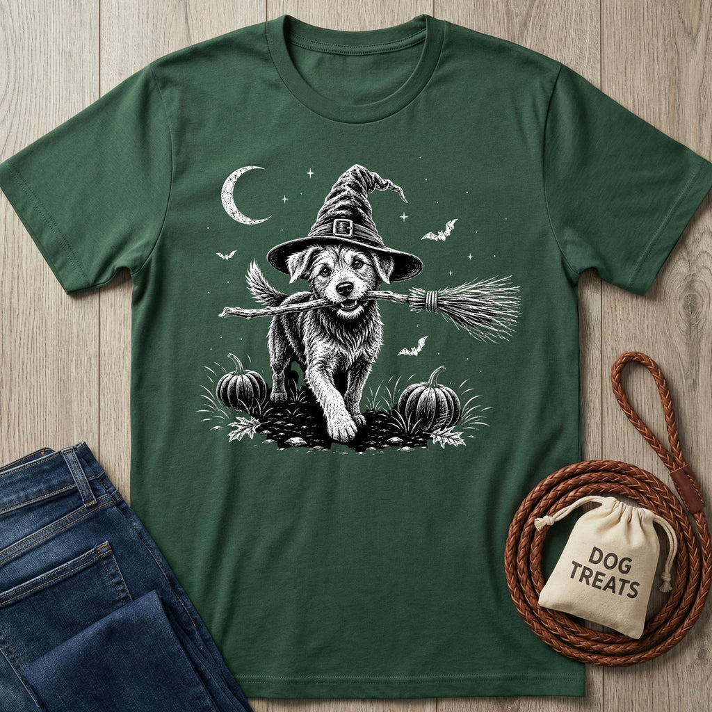 Forest green t-shirt featuring a graphic of a puppy in a witch hat holding a broomstick in a pumpkin patch.