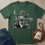 Forest green t-shirt featuring a graphic of a puppy in a witch hat holding a broomstick in a pumpkin patch.