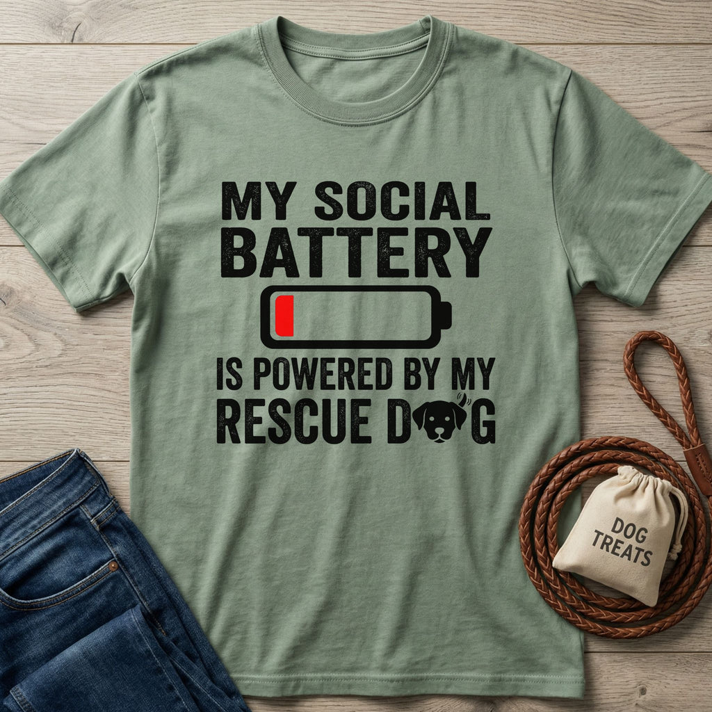 Sage green Gildan Softstyle® t-shirt with "My Social Battery Is Powered By My Rescue Dog" text and battery icon.