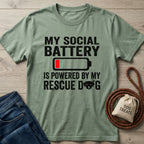 Sage green Gildan Softstyle® t-shirt with "My Social Battery Is Powered By My Rescue Dog" text and battery icon.