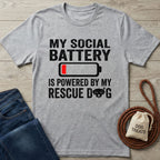 Light grey Gildan Softstyle t-shirt with "My Social Battery is Powered by My Rescue Dog" graphic.