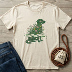 Cream Gildan Softstyle t-shirt with a green, floral dog design and "Bloom Where You Are Rescued" banner.