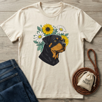 Cream cotton t-shirt with a Rottweiler surrounded by yellow sunflowers and white daisies.