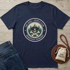Navy blue Gildan Softstyle t-shirt with "The Dogs > People Club" logo, dog, bones, and trees.