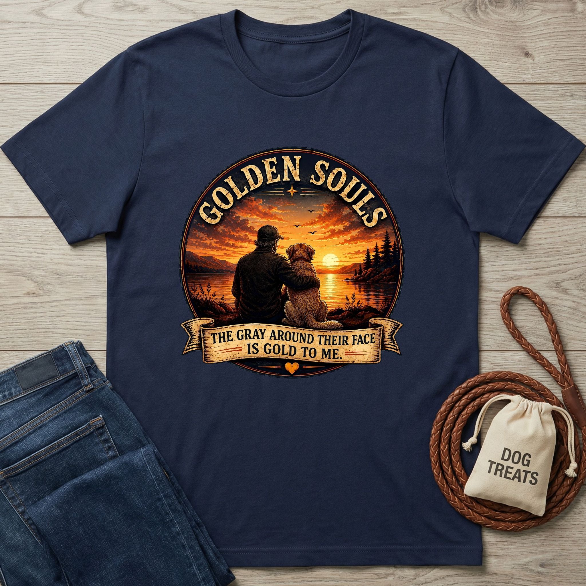 Navy blue Golden Souls t-shirt featuring a man and senior dog watching a sunset over a lake.