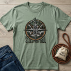 Sage green Gildan Softstyle t-shirt with a compass, mountains, trees, a rescue dog, and "Steady My Soul" text.