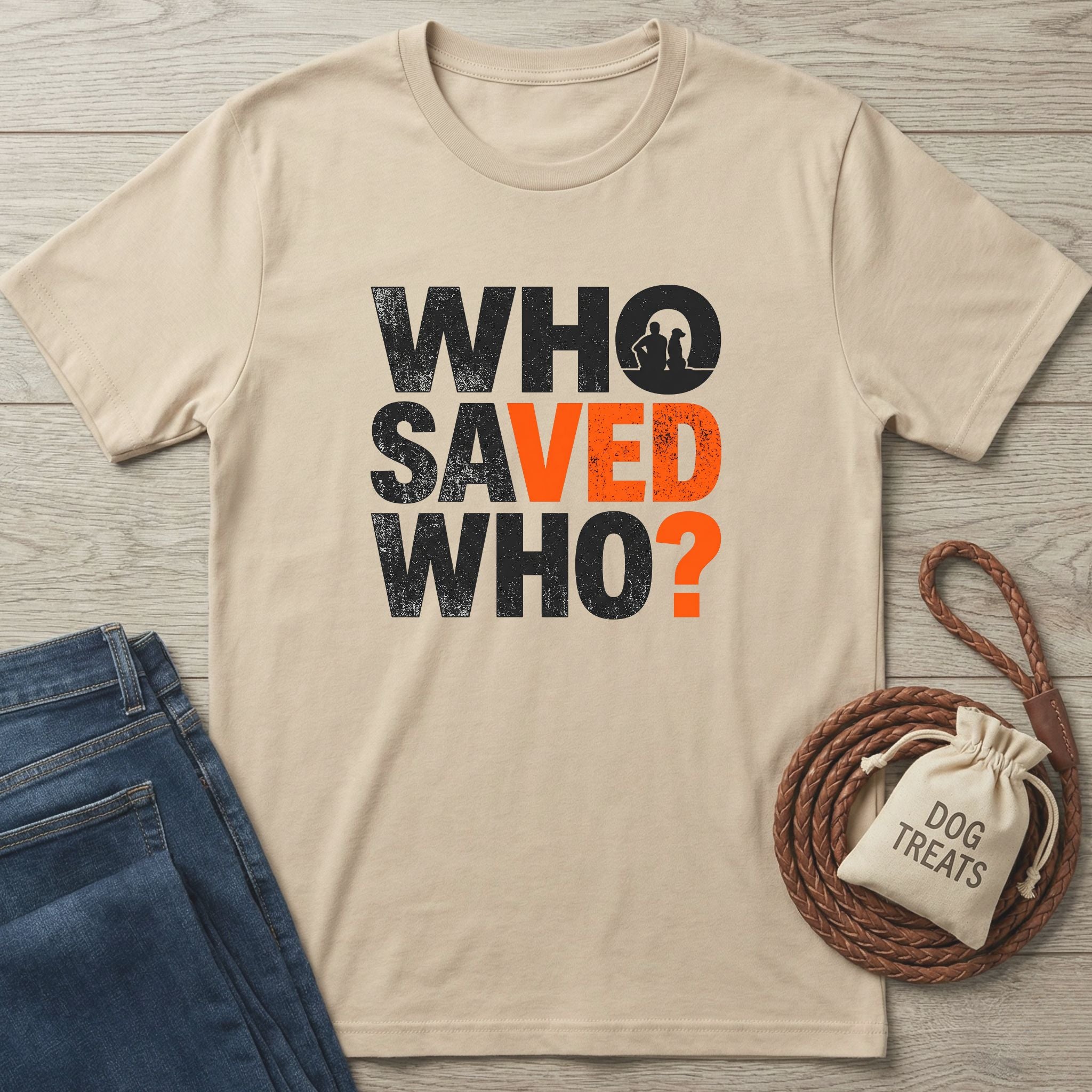 Beige Gildan Softstyle® 64000 tee with "WHO SAVED WHO?" graphic, featuring a dog and person silhouette.