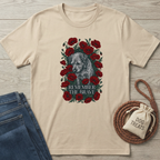 Beige cotton t-shirt with a graphic of a dog surrounded by red poppies and "REMEMBER THE BRAVE" text.