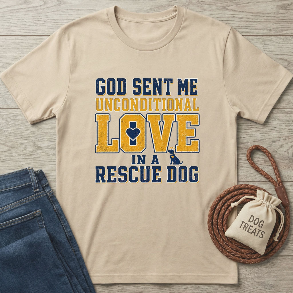 God Sent a Rescue T-Shirt, a beige Gildan Softstyle tee with blue and yellow "God Sent Me Unconditional Love In A Rescue Dog" text.