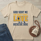 God Sent a Rescue T-Shirt, a beige Gildan Softstyle tee with blue and yellow "God Sent Me Unconditional Love In A Rescue Dog" text.