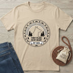 Tan Gildan Softstyle® t-shirt with "Second Chance Rescue League" dog and tree graphic, next to jeans and dog treats.
