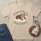 Beige cotton t-shirt with a brown bulldog in a bed and "Professional Napper: Senior Division" text.