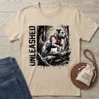 Unleashed T-shirt: beige Gildan Softstyle tee with a jumping dog graphic and "UNLEASHED" text.