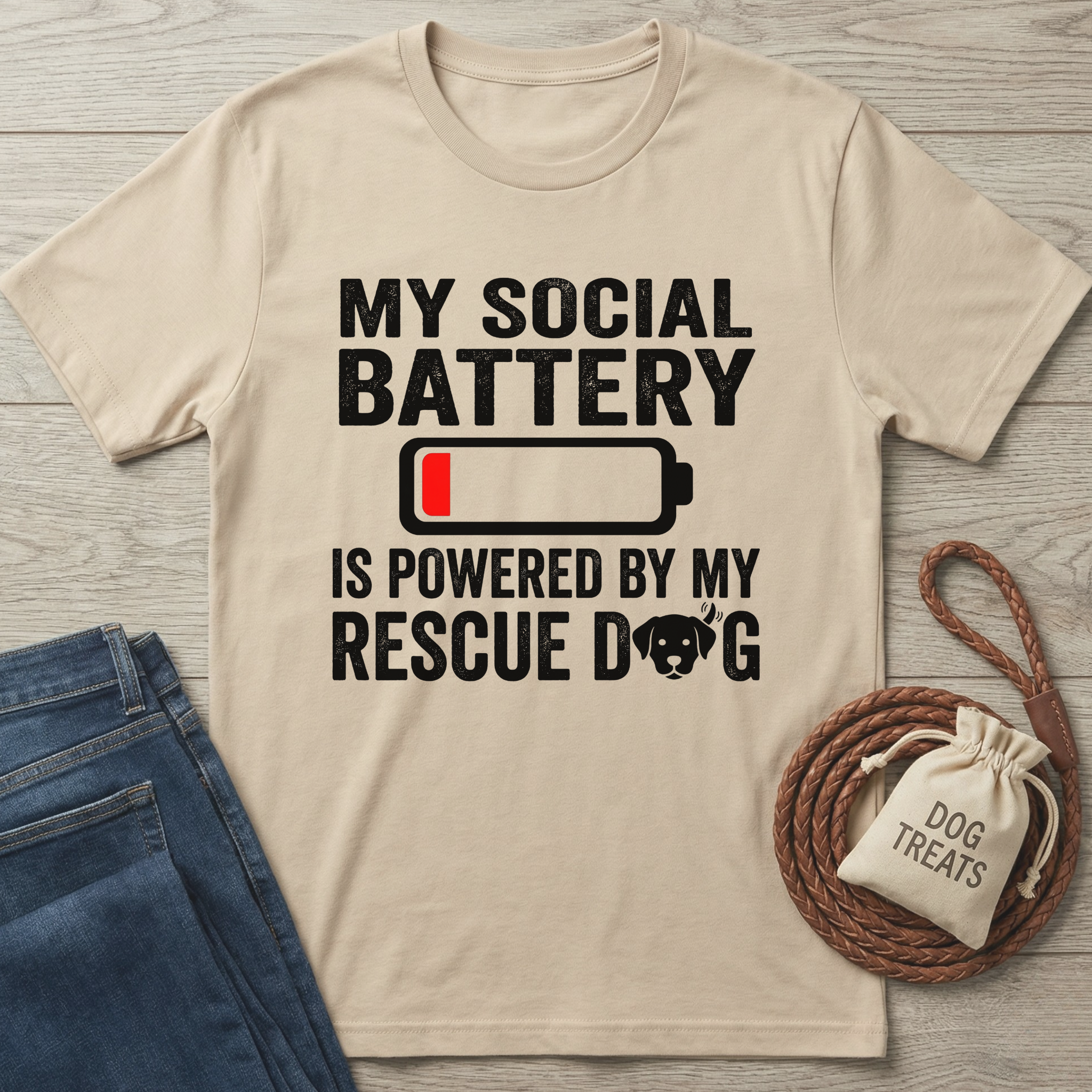 Beige "My Social Battery" t-shirt with a low battery icon and "is powered by my rescue dog" text.