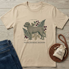 Tan Gildan Softstyle® t-shirt with a "Rescue Specimen" dog illustration, fern, and berries.