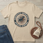 Tan Gildan Softstyle® t-shirt with "Perfectly Imperfect Rescue Strong" graphic featuring a running dog.